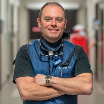 Dr. Martin Ferrillo, a quick pose with arms folded before starting a procedure